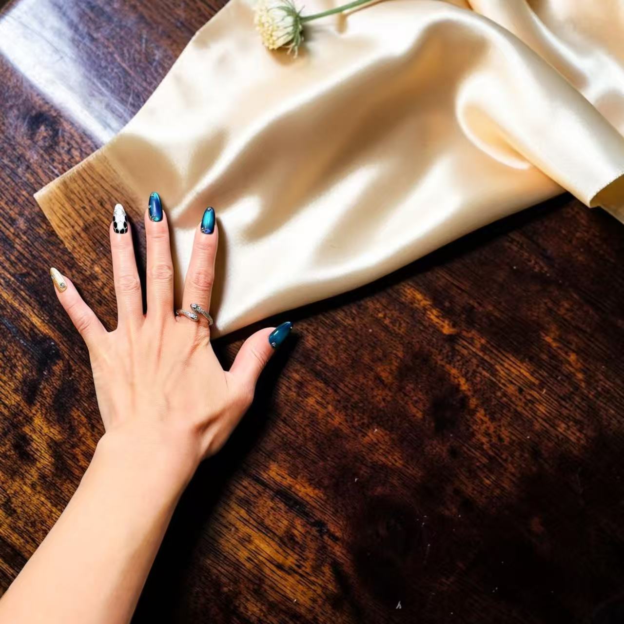 Sleek snake ring in silver tone